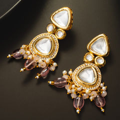 Gold Rodium Polish Green color Earrings in Copper studded with Kundan, Pearl