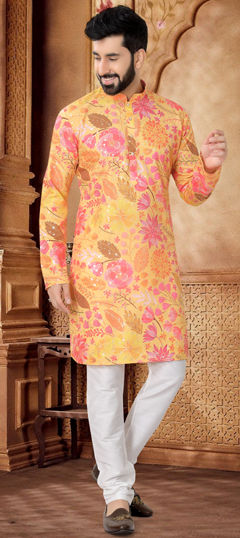 Yellow color Kurta Pyjamas in Cotton fabric with Foil Print work