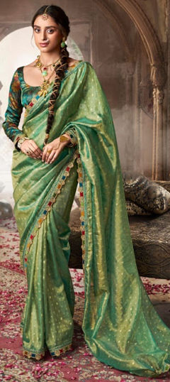 Green color Saree in Tissue fabric with Lace work