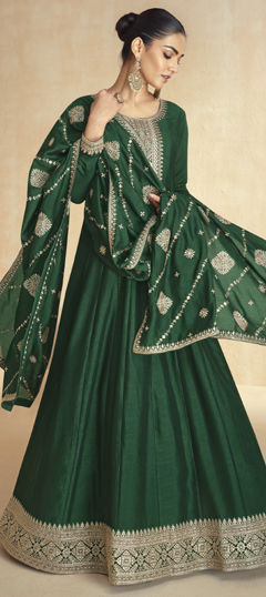 Green color Gown in Silk fabric with Embroidered, Thread work