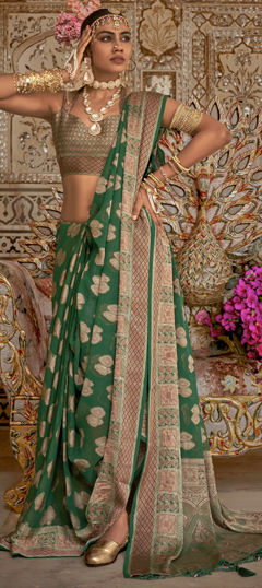 Green color Saree in Georgette fabric with Weaving work