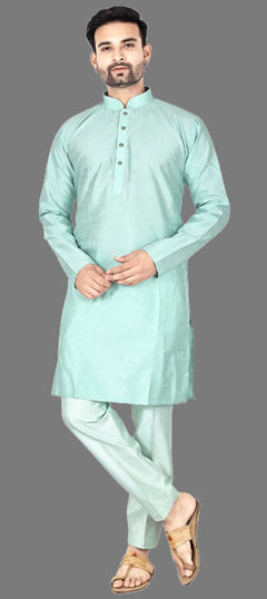 Green color Kurta Pyjamas in Art Silk fabric with Thread work