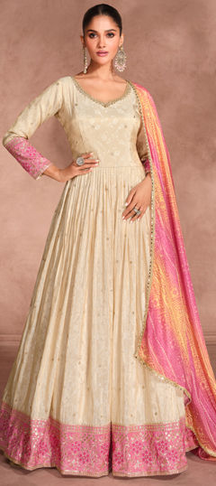 Beige and Brown color Gown in Jacquard fabric with Embroidered, Sequence, Thread work