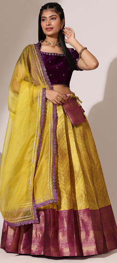 Yellow color Lehenga in Silk fabric with Weaving work