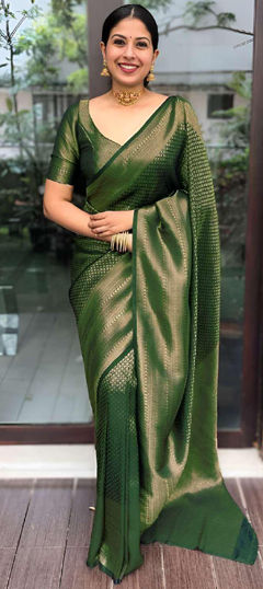 Green color Saree in Art Silk fabric with Weaving work