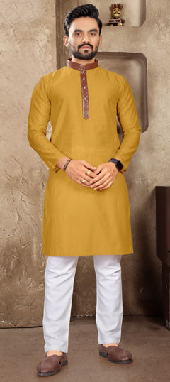 Yellow color Kurta Pyjamas in Linen fabric with Thread work