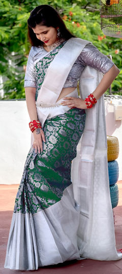 Green color Saree in Art Silk fabric with Weaving work