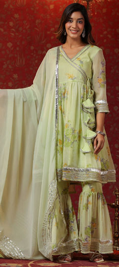 Yellow color Salwar Kameez in Chiffon fabric with Lace, Printed work