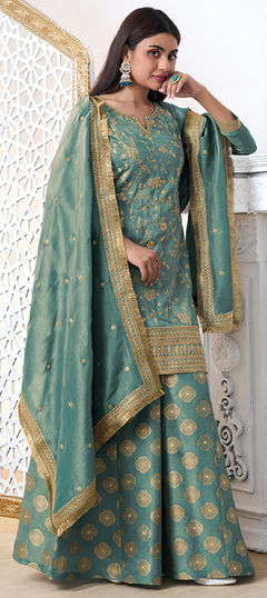 Blue color Salwar Kameez in Tissue fabric with Patch work