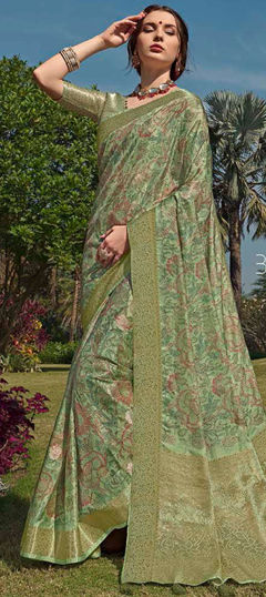 Green color Saree in Silk fabric with Weaving work