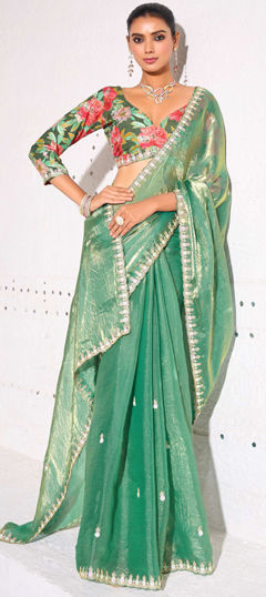 Green color Saree in Tissue fabric with Sequence, Thread work