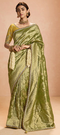 Green color Saree in Tissue fabric with Sequence, Thread, Weaving, Zari work