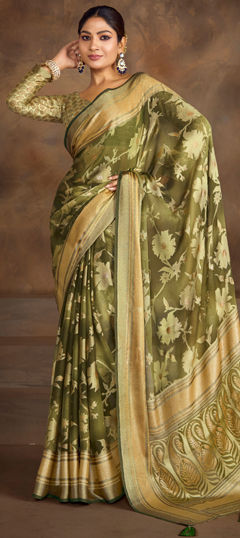 Green color Saree in Brasso fabric with Weaving work