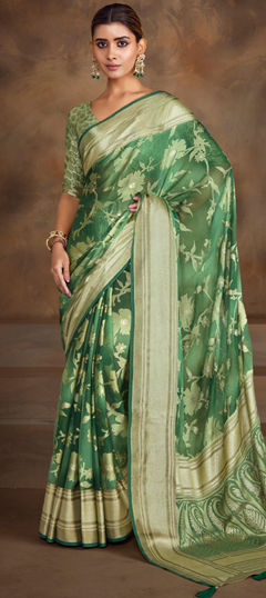 Green color Saree in Brasso fabric with Weaving work