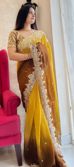 Yellow color Saree in Faux Georgette fabric with Embroidered, Sequence, Zari work