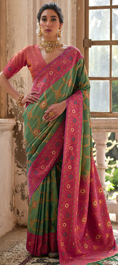 Green color Saree in Banarasi Silk fabric with Weaving work