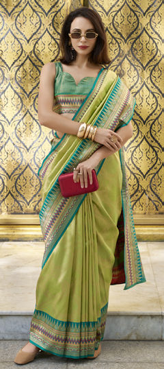 Green color Saree in Tissue fabric with Weaving, Zari work