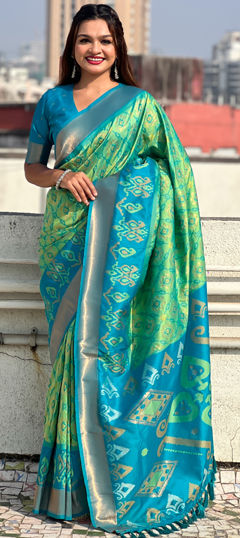 Green color Saree in Patola Silk fabric with Weaving, Zari work