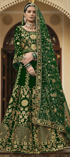 Green color Lehenga in Velvet fabric with Embroidered, Mirror, Sequence, Stone, Thread, Zari work