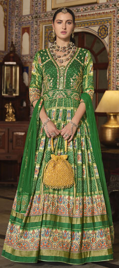 Green color Gown in Silk fabric with Embroidered, Foil Print, Resham, Stone, Zari work