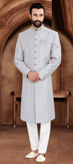 Blue color Sherwani in Jacquard fabric with Embroidered, Sequence, Thread work