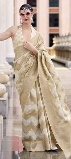 Beige and Brown color Saree in Cotton fabric with Weaving work