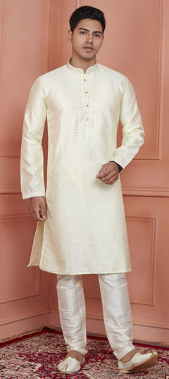 Yellow color Kurta Pyjamas in Jacquard fabric with Thread work