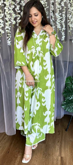 Green color Salwar Kameez in Rayon fabric with Printed work