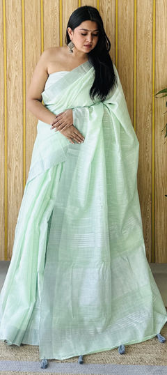 Green color Saree in Linen fabric with Weaving work