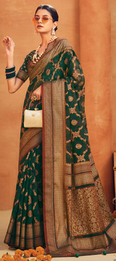 Green color Saree in Georgette fabric with Weaving work