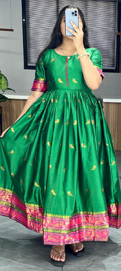 Green color Gown in Silk cotton fabric with Weaving, Zari work