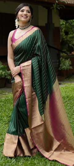 Green color Saree in Art Silk fabric with Weaving work