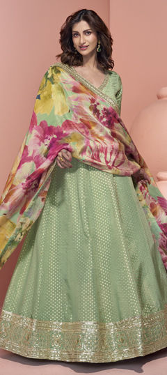 Green color Gown in Jacquard, Organza Silk fabric with Cut Dana, Mirror, Sequence, Weaving work