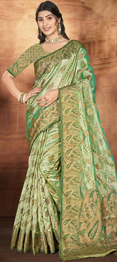 Green color Saree in Organza Silk fabric with Weaving work