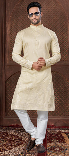 Green color Kurta Pyjamas in Art Silk fabric with Embroidered, Thread, Zari work