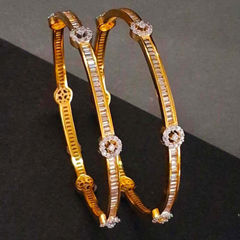 Gold Rodium Polish White and Off White color Bangles in Metal Alloy studded with CZ Diamond