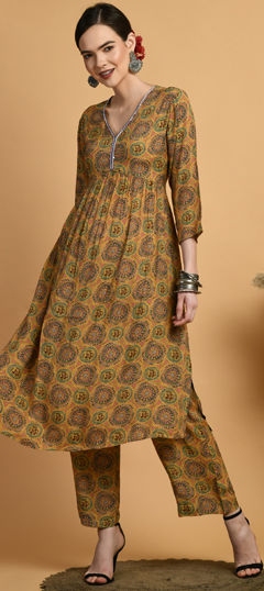 Yellow color Salwar Kameez in Muslin fabric with Bugle Beads, Printed work