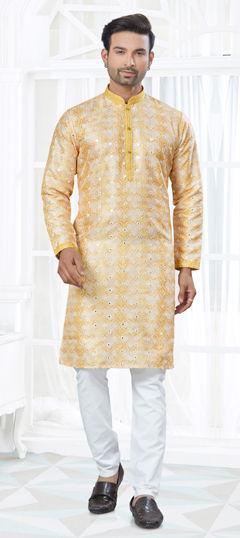 Yellow color Kurta Pyjamas in Silk fabric with Mirror work