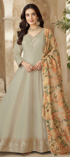 Green color Gown in Silk fabric with Sequence, Thread work