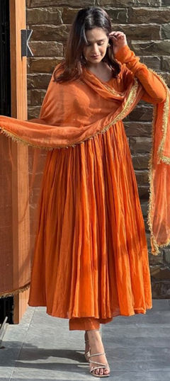 Orange color Salwar Kameez in Muslin fabric with Thread work