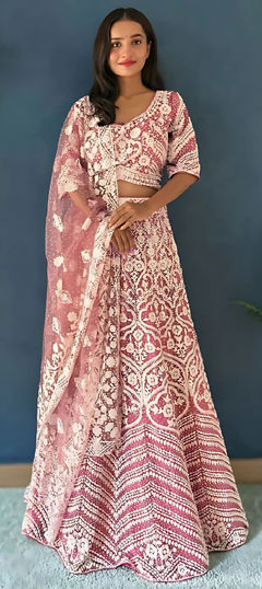 Pink and Majenta color Lehenga in Net fabric with Moti work