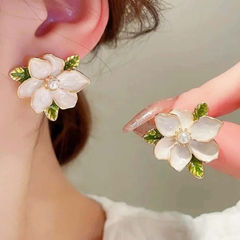 Gold Rodium Polish White and Off White color Earrings in Metal Alloy studded with Pearl