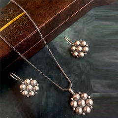 Silver Rodium Polish Silver color Pendant in Brass studded with Artificial
