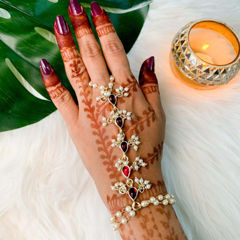 Gold Rodium Polish Red and Maroon color Haath Paan in Metal Alloy studded with Pearl