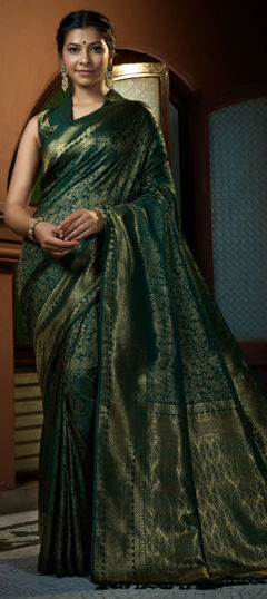 Green color Saree in Kanjeevaram Silk fabric with Weaving work