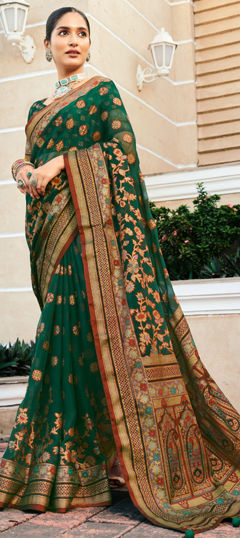 Green color Saree in Georgette fabric with Weaving work