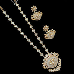 Gold Rodium Polish White and Off White color Pendant in Brass studded with Kundan