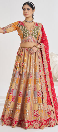 Yellow color Lehenga in Dolla Silk fabric with Aari, Sequence work