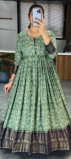 Green color Gown in Tussar Silk fabric with Printed work