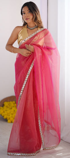 Pink and Majenta color Saree in Net fabric with Lace work